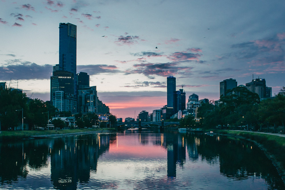 Melbourne city skyline across the Yarra River at dusk